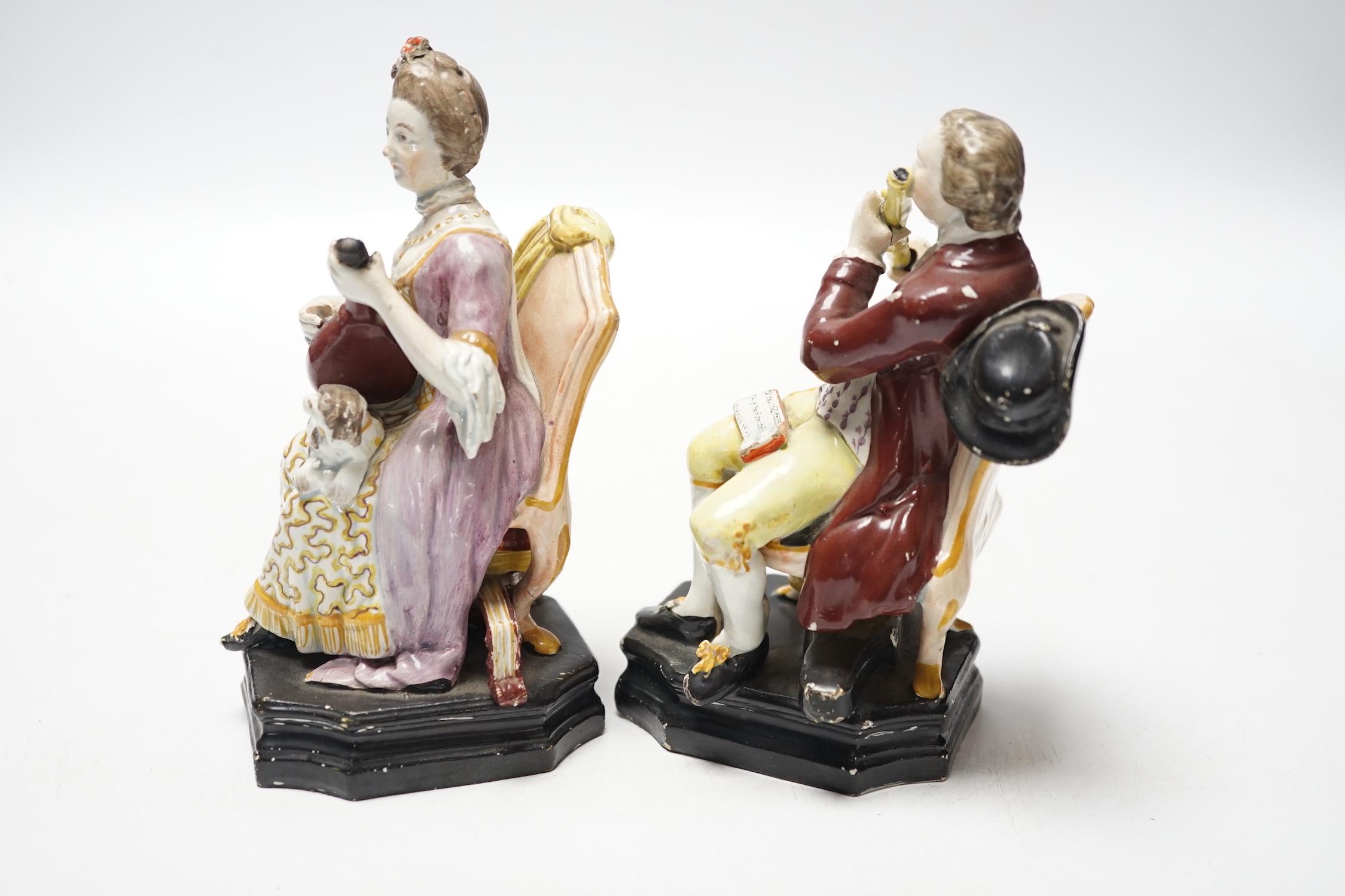 A pair of Staffordshire pearlware figures of musicians seated on chairs, c.1825, 14cm